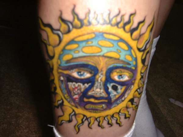 hippie sun tattoos