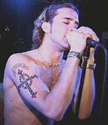 Singers Cross tattoo