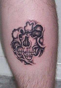 embedded skull tattoo