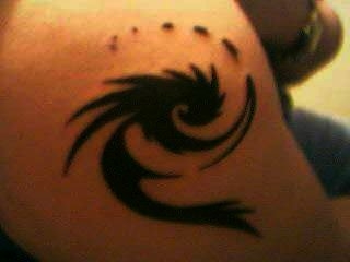 tribal spiral tattoo