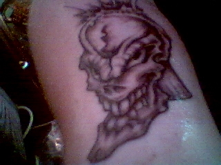 Skull on Arm tattoo