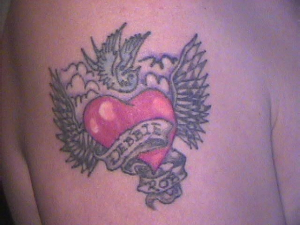 HEART/WINGS tattoo