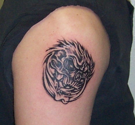swirling skull tattoo