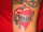 Heart w/ Outcast Ribbon tattoo