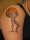 Atlas holding a basketball tattoo