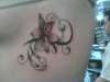 A Lily on my rib tattoo