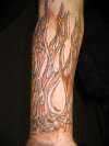 Wood grain flames tattoo