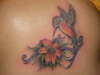bird with flower tattoo