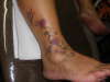 butterflie and dragonflie   in foot tattoo
