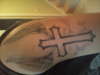 cross , wings tattoo