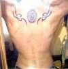 Tribal Sun/Flames tattoo