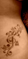 music/ stars left hip tattoo