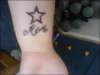 stars with mom written tattoo