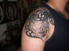 tribal with taino symbol tattoo