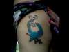 Bird tattoo on side tattoo