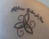 Celtic Design with Latin Writing tattoo