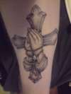 First tattoo cross and hands tattoo