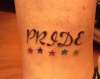 Pride w/ stars tattoo