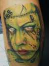 Zombie type woman tattoo