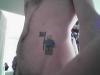 Lego man tattoo