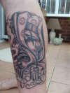 jester on my left leg tattoo