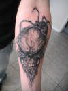 skull with spider tattoo