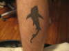 Bold shark/fish tattoo