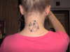 Stars on neck tattoo
