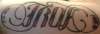 True/Love Ambigram tattoo