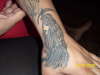 left hand tattoo