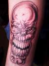 mean skull tattoo