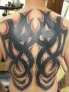 tribal backpiece coverup tattoo