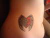 Girlfriends winged heart tattoo