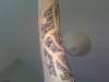 Half Finished Maori Scale Sleeve tattoo
