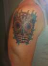 Suga Skull tattoo