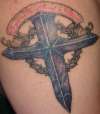 Symbolic Cross tattoo