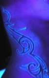 UV outline of tribal tattoo