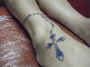 blue rosary tattoo