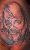 half skull portrait tattoo
