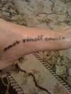 love conquers all tattoo