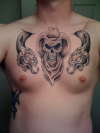 second sess on chest, 1 more to go for background and color tattoo