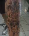 skull an ddagger tattoo