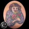 Clown girl with flowers tattoo
