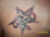 Snake in star tattoo