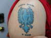 Haste the Day pheonix logo with italian writing tattoo