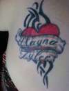Tribal heart tattoo