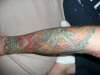 carp forearm tattoo