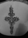 cross on my lower to middle of back tattoo