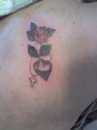 rose and locket tattoo