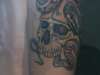 skull and snake pt2 tattoo